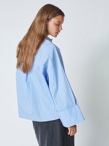 Chemisier 'Bianca' co'couture en bleu