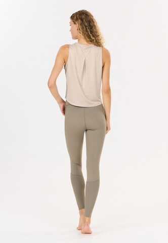 Athlecia Sports top 'Pacy V2' in Beige