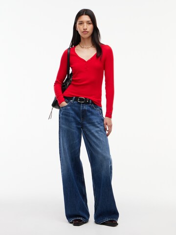 Tricou de la Tommy Jeans pe roșu