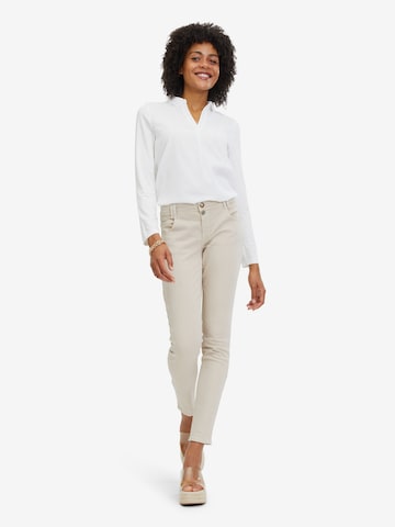 Coupe slim Pantalon Cartoon en beige