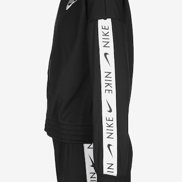 Nike Sportswear Облекло за бягане в черно