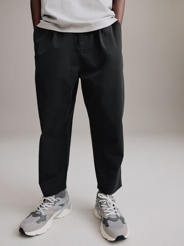 Next - regular Pantalón en negro: frente