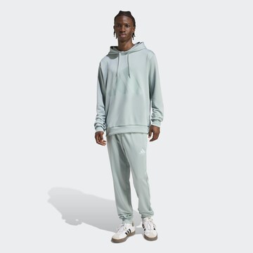ADIDAS SPORTSWEAR Tracksuit in Green: front