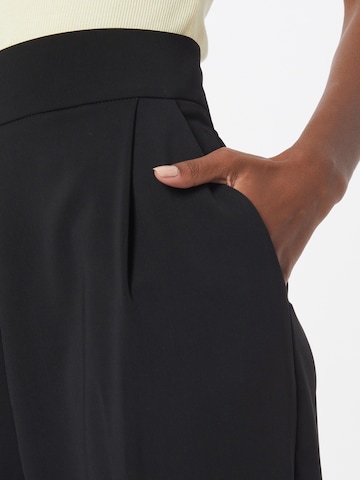 IMPERIAL Tapered Pleat-front trousers in Black