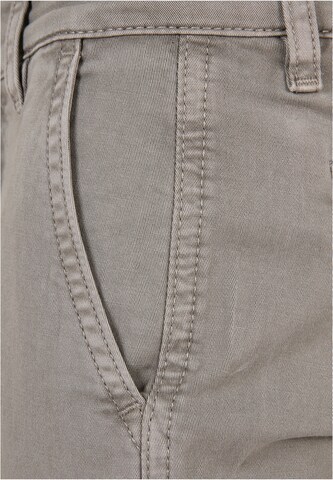 Effilé Pantalon Urban Classics en gris