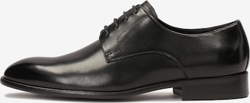 Kazar Lace-Up Shoes in Black: front