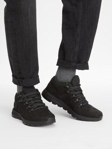 TIMBERLAND Lace-Up Boots 'Trekker' in Black: front