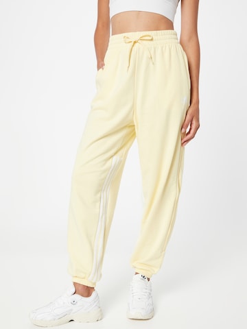ADIDAS SPORTSWEAR Workout Pants in Yellow: front