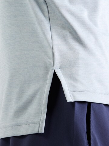 Reebok - Camiseta funcional en azul