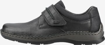 Rieker Slip On in Schwarz