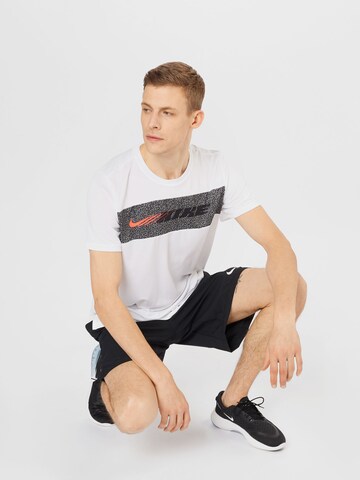 NIKE Performance shirt 'Superset Energy' in White