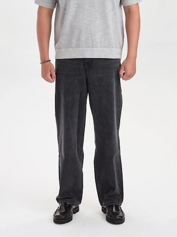 Dxnmxrk - Loosefit Vaquero 'DXHector Relaxed Fit Jeans Black' en negro: frente