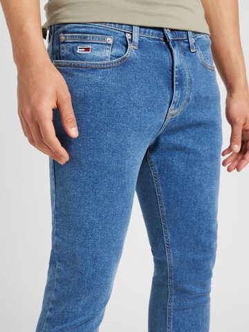 mėlyna Tommy Jeans Prigludęs Džinsai 'AUSTIN SLIM TAPERED'