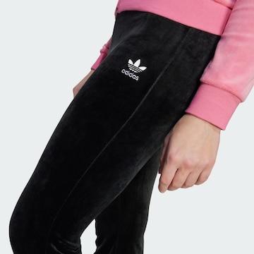 ADIDAS ORIGINALS Flared Trousers in Black