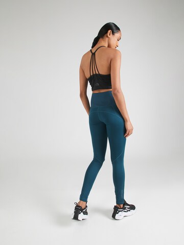 Skinny Pantalon de sport Champion Authentic Athletic Apparel en bleu