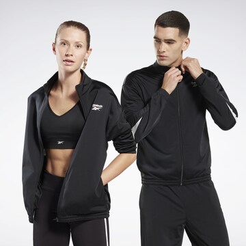 Reebok - Sudadera con cremallera deportiva en negro: frente