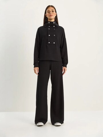 Bianco Lucci - Calças de fato em preto: frente