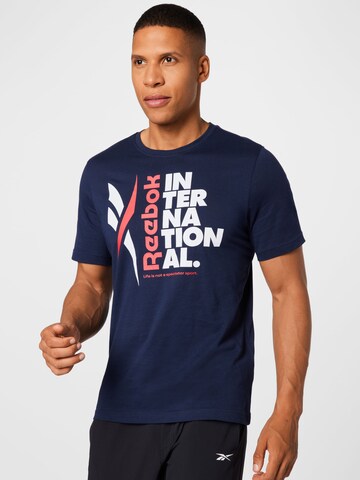 T-Shirt fonctionnel Reebok en bleu : devant