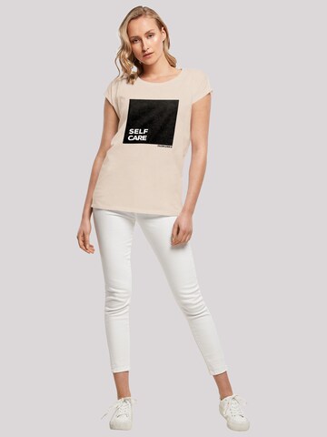 T-shirt 'SELF CARE' F4NT4STIC en beige