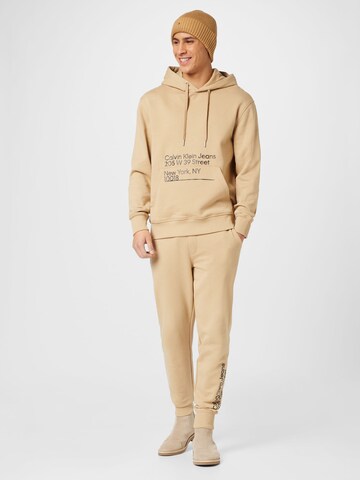Calvin Klein Jeans Tapered Pants in Beige