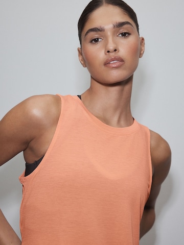 Haut de sport Next en orange