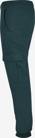 Tapered Pantaloni cargo di Urban Classics in verde