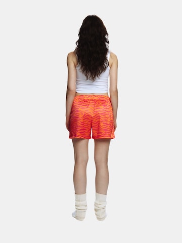 EKCENTRIK Loose fit Pants 'Wild Sunrise' in Red