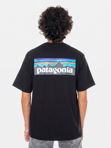 PATAGONIA Koszulka 'M'S P-6 LOGO RESPONSIBILI-TEE BLACK' w kolorze czarny
