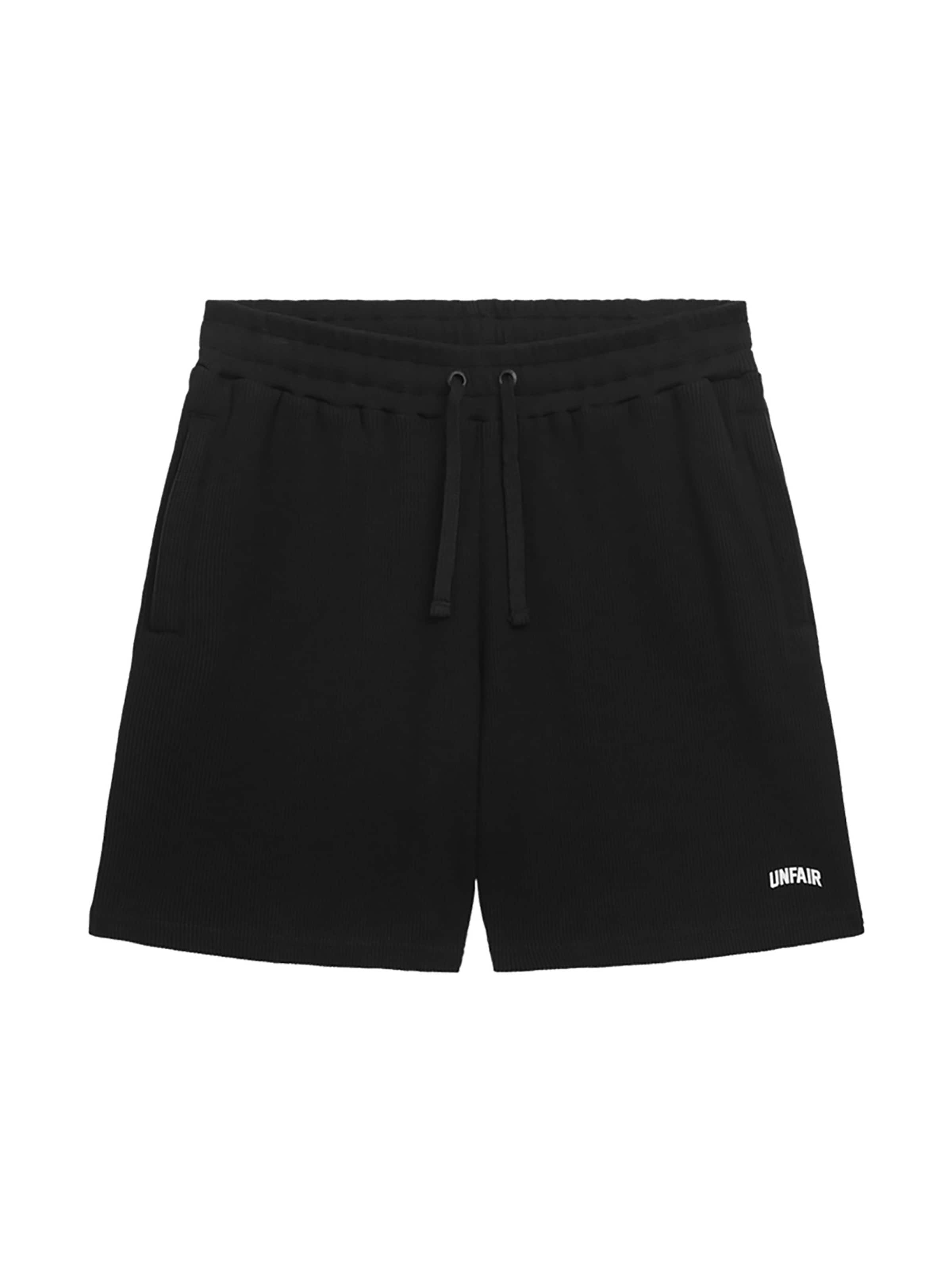 Unfair Athletics Regular Pants 'Curved Waffle' in Black: front