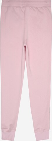 UNDER ARMOUR Tapered Sporthose in Pink