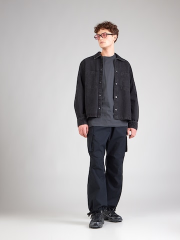 Nike Sportswear T-Shirt 'ATHL' in Grau