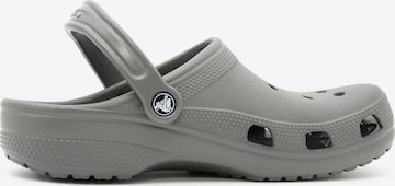 pilka Crocs Klumpės