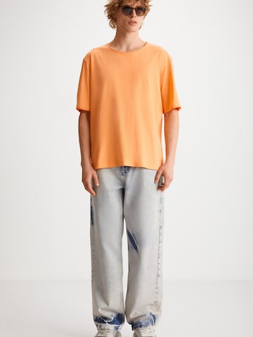 Grimelange T-shirt i orange