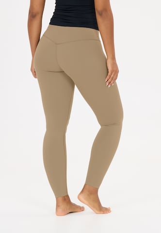 Athlecia Skinny Sports trousers 'Emarri' in Brown