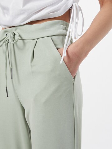 VERO MODA Alt kitsenev Voltidega püksid 'Eva', värv roheline