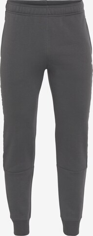 Champion Authentic Athletic Apparel Tapered Pants in Grey: front