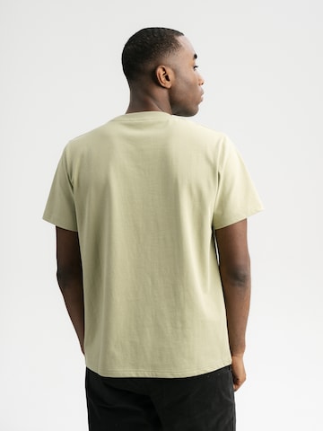 MELA T-shirt 'PRAVIN' i grön