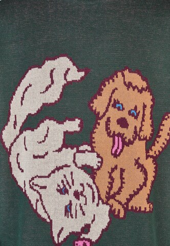 Cleptomanicx Sweater 'Cat & Dog' in Green