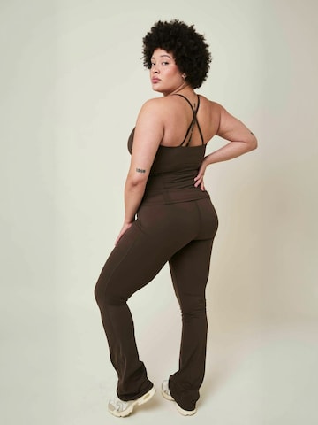 Copenhagen Cartel Regular Trousers ' Art ' in Brown: back