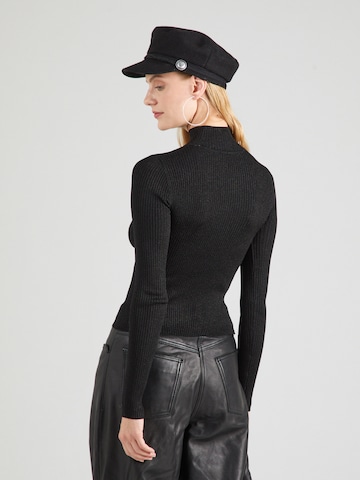 Pulover de la Versace Jeans Couture pe negru