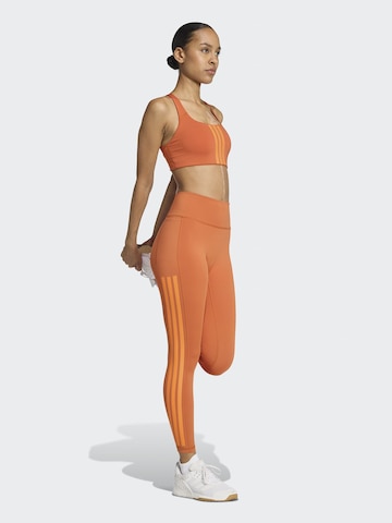 ADIDAS PERFORMANCE Skinny Workout Pants 'Optime' in Orange: front