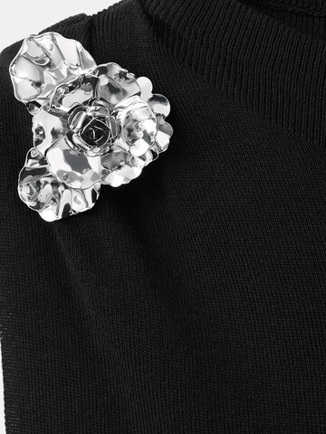 Tops en tricot 'TAPIES' MANGO en noir