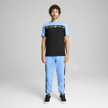 PUMA Regular Trousers 'Around The Block' in Blue