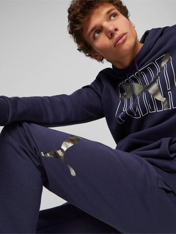 regular Pantaloni sportivi 'Puma Ess Logo Lab Sweatpant' di PUMA in blu