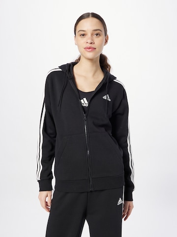 ADIDAS SPORTSWEAR Спортна жилетка с качулка 'Essentials' в черно: отпред