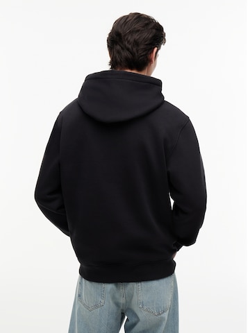 Tommy Jeans - Sweatshirt 'ESSENTIAL' em preto
