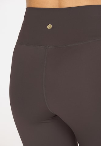 Athlecia Skinny Sportbroek 'FRANZ' in Bruin