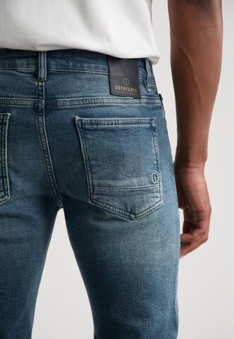 Coupe slim Jean 'Mr. E' Dstrezzed en bleu