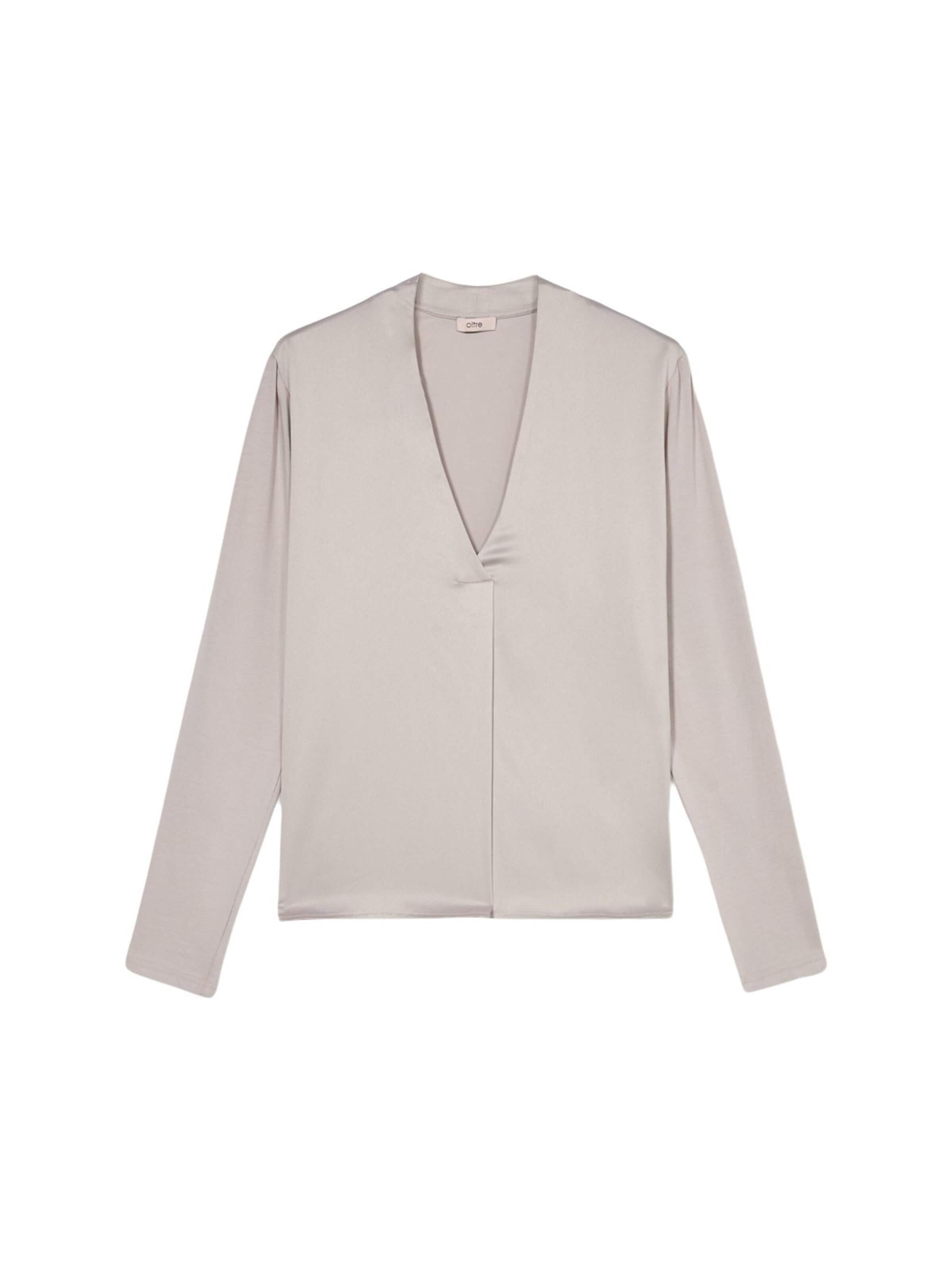 Top di oltre in beige: frontale