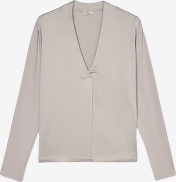 Top di oltre in beige: frontale